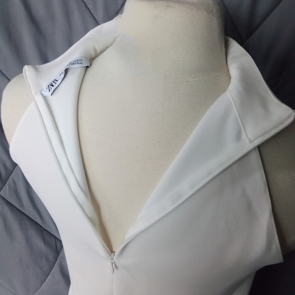 Women's Zara Sleeveless Mock Neck Split High Low Hem Zipper Back White Blouse - Picture 6 of 12
